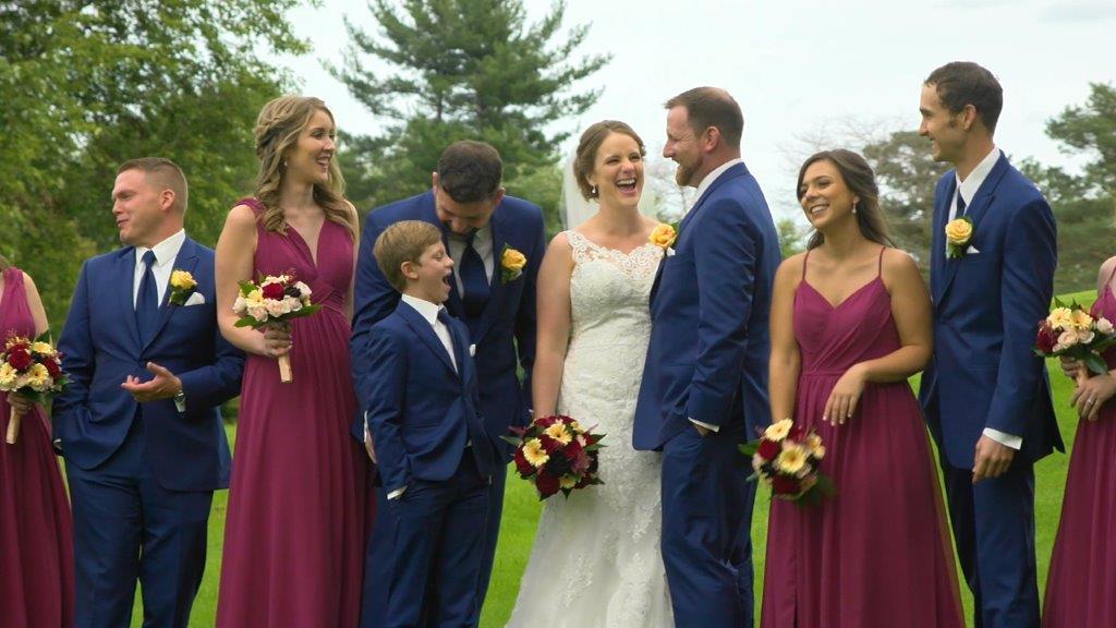 Bride and groom laughing normanside county club