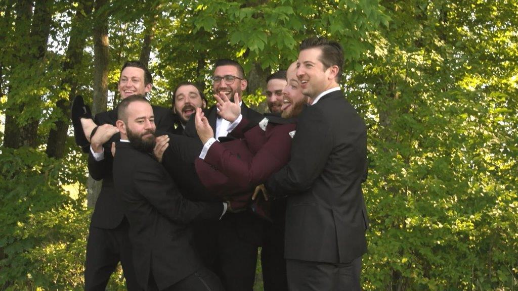 groomsmen taking pics at Saratoga Grand National