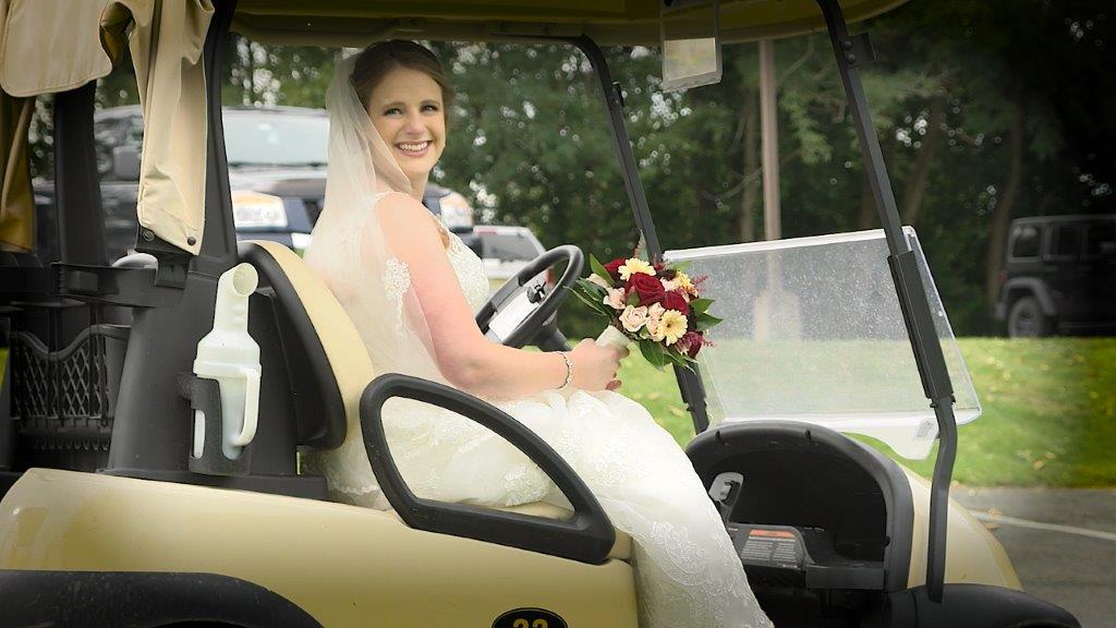Maureen in normanside golf cart