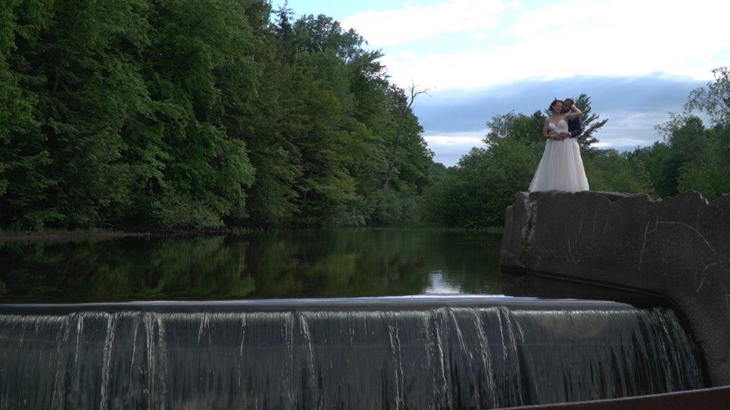 chelsea and lewis at falls at Mansion Inn